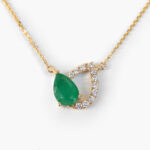 yellow gold pear shape emerald and diamond shadow pendant