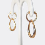 side view of yellow gold diamond dangle earrings