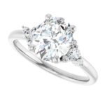 diamond accented oval diamond engagement ring