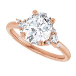 rose gold oval diamond accented engagement ring