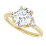 yellow gold diamond accented oval engagement ring