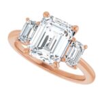 rose gold three stone emerald cut diamond engagement ring
