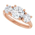 rose gold three stone diamond engagement ring