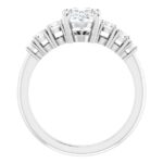 side view of white gold diamond accented engagement ring