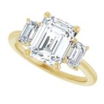 yellow gold three stone emerald cut diamond engagement ring