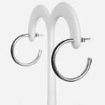 side view of sterling silver black enamel hoop earrings