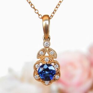 yellow gold antique style sapphire and diamond pendant