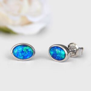 white gold oval opal studs