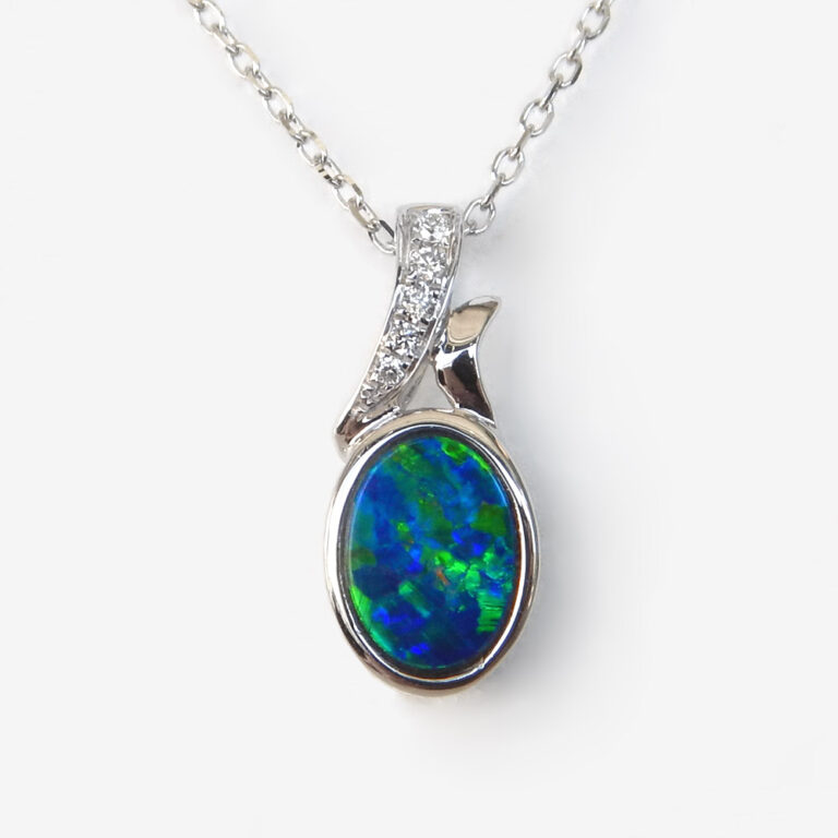white gold opal and diamond pendant