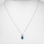white gold opal and diamond pendant on chain