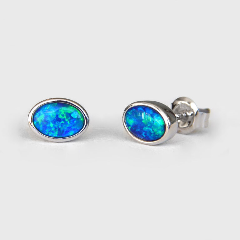 white gold oval opal studs
