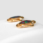side view of opal earrings