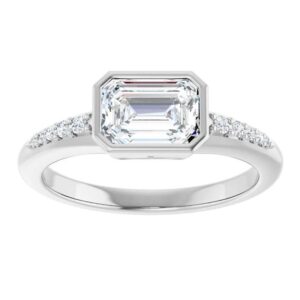 white gold bezel set emeraldcut diamond engagement ring