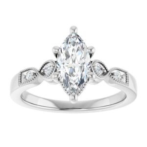 white gold vintage style marquise diamond engagement ring with milgrain edges