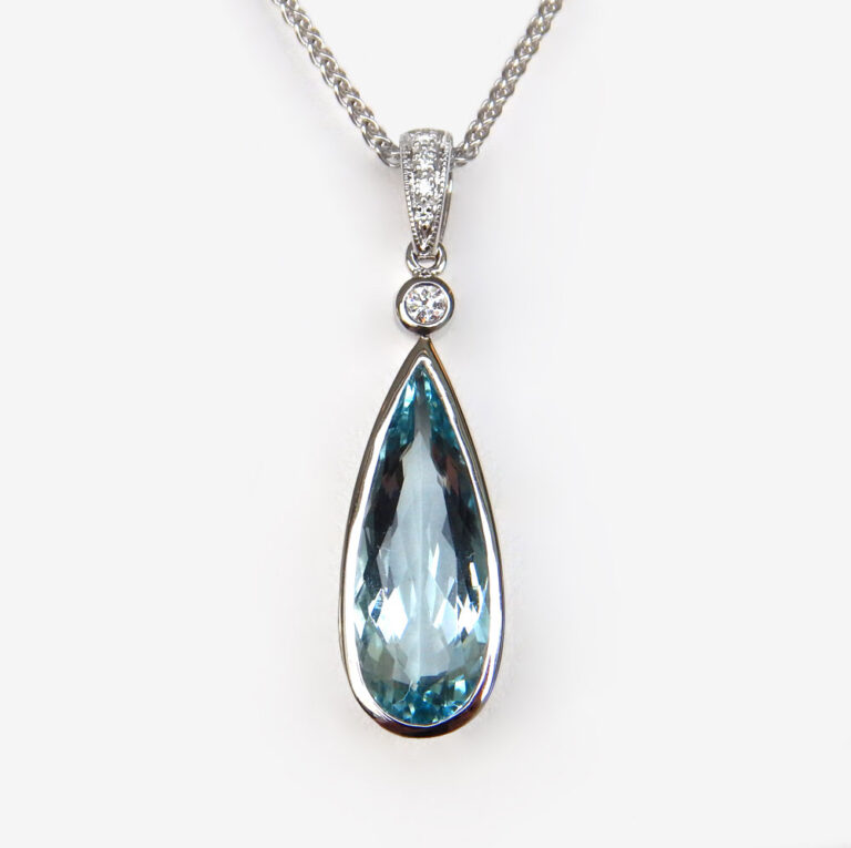 white gold aquamarine and diamond pendant