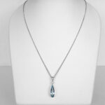 white gold aquamarine and diamond pendant on chain