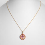 yellow gold ruby and diamond compass necklace