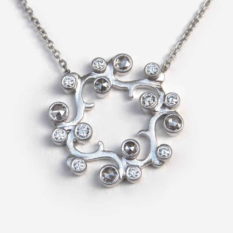 Click to view larger size white gold diamond swirl pendant