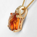 side view of yellow gold citrine pendant