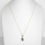 yellow gold emerald pendant on chain