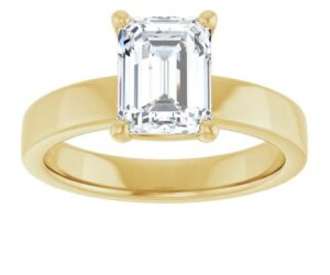 chunkier band yellow gold engagement ring with an emerald cut diamond in the center