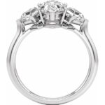 side view of three stone diamond engagement ring