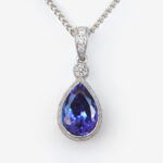 white gold tanzanite and diamond pendant