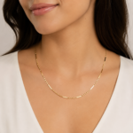 yellow gold necklace on model