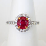 white gold ruby and diamond halo ring