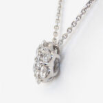 side view of diamond cluster necklace