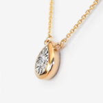 side view of diamond solitaire necklace