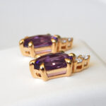 side view of yellow gold amethyst and diamond earrings