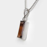side view of smoky quartz and diamond pendant
